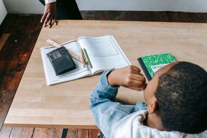 A student working with a textbook